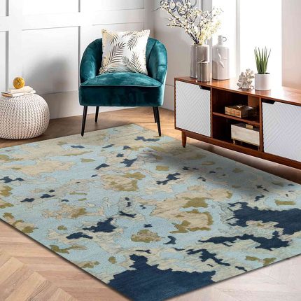 Abstract design blue base hand tufted carpet