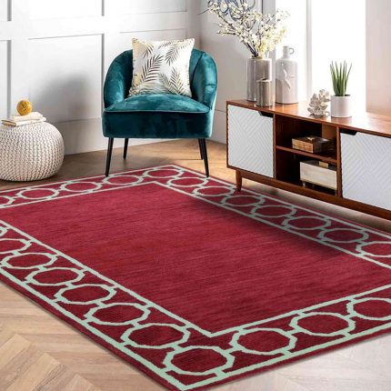 Red handtufted woollen carpet